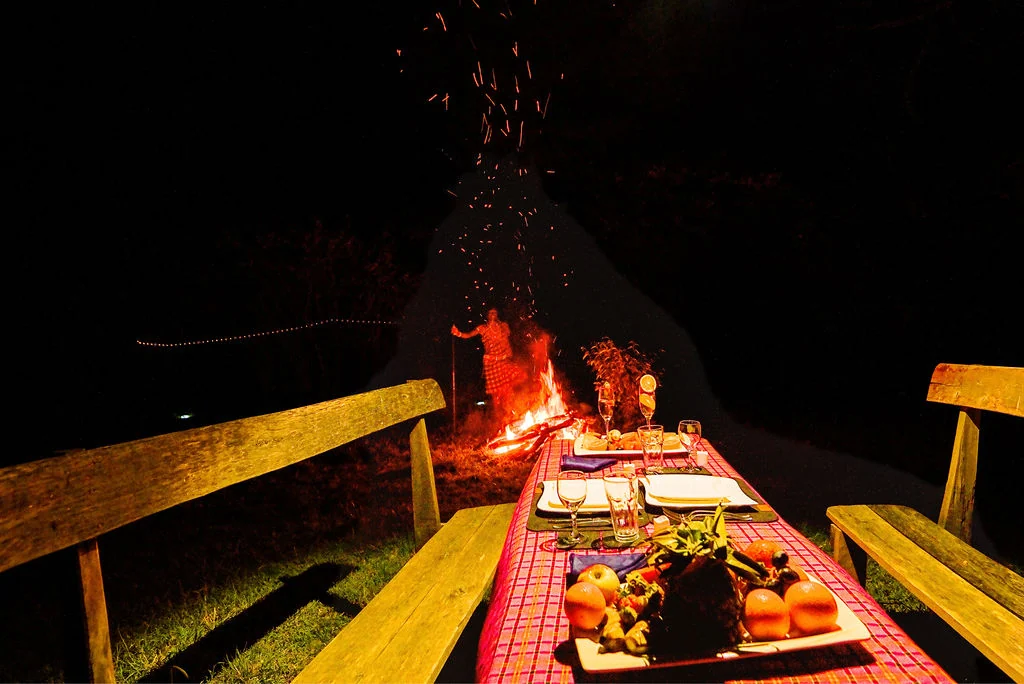 A candlelit Maasai dinner and dance, staged as a private evening.